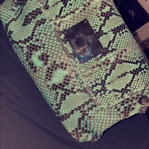 Tiffany& Co.  python shoulder bag in blue.